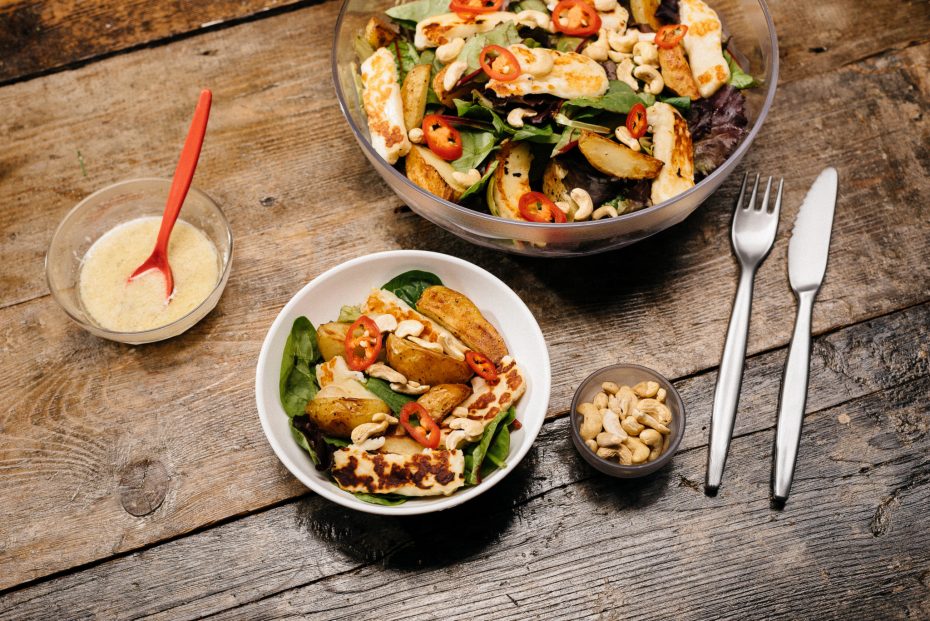 Halloumi Salad in White Bowl with Silver Cutlery