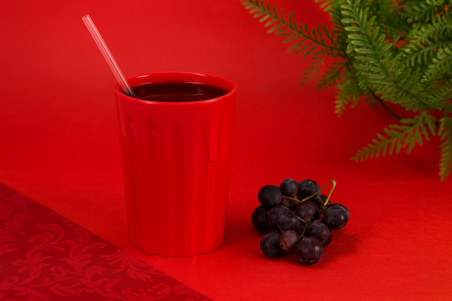 Red Fluted Tumbler with Grape Juice