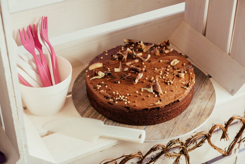 Scraper in use with Cake