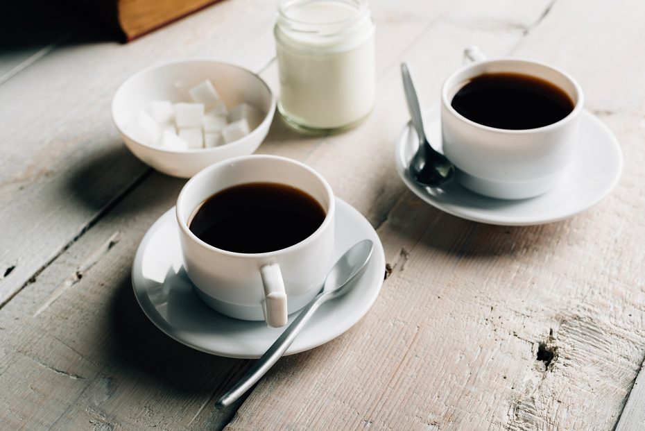 Black Coffee in white mug with saucer