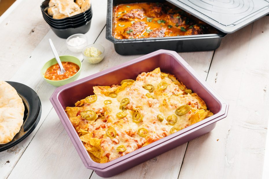 Nachos in a purple baking tray