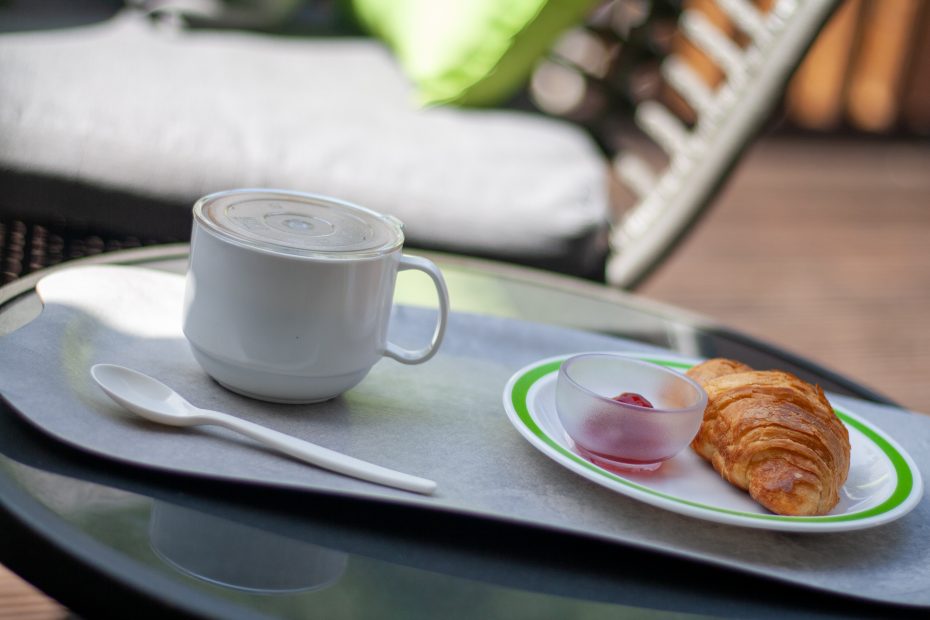 White Coffee Mug on a Tray in Outdoor Setting