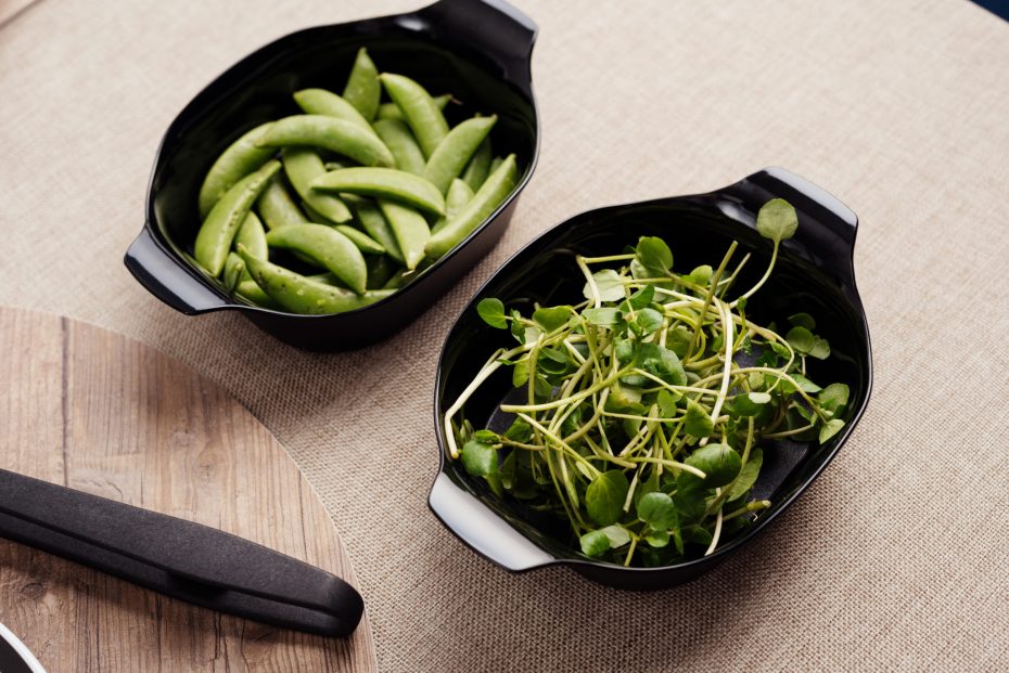 Greens in ingredient prep bowls