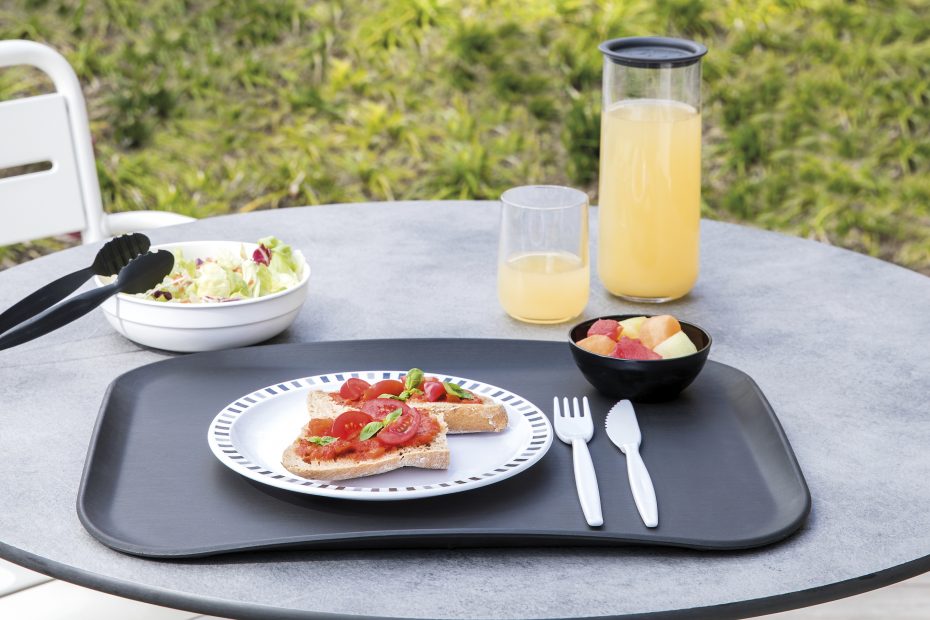 Clear Carafe with Orange Juice in Outdoor Breakfast Setting