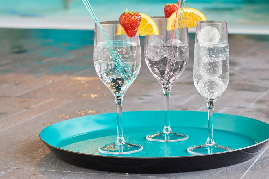 Wine Glasses with Cocktails at a Pool