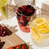 Fluted Pitchers with water and fresh fruit