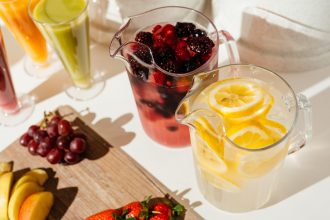 Fluted Pitchers with water and fresh fruit