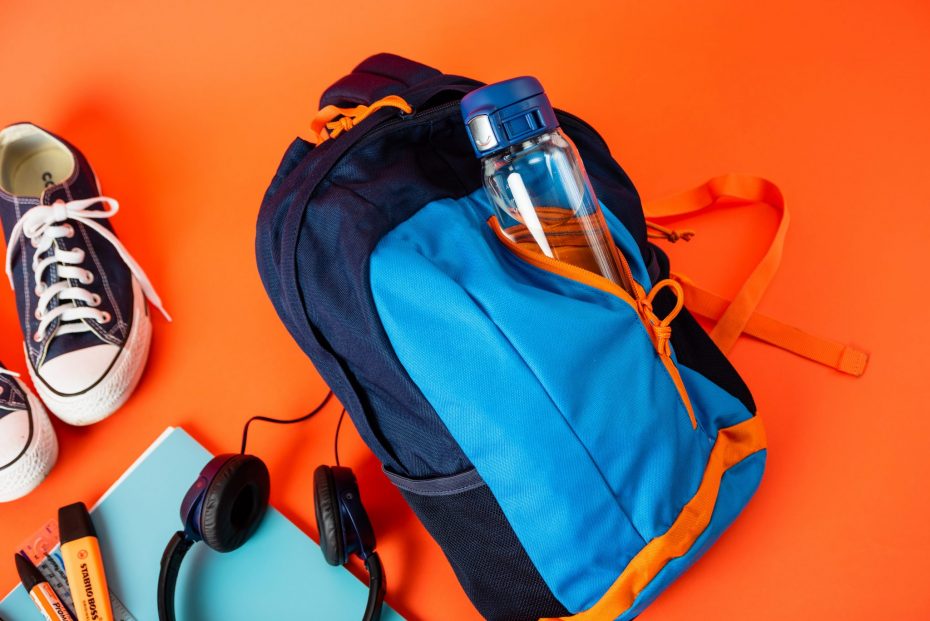 Water Bottle with Blue Sports Cap in a Backpack