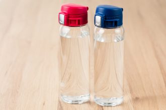 Water Bottles with Pink and Blue Caps