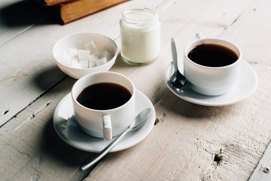 Coffee in White Cup with a Silver Copolyester Teaspoon