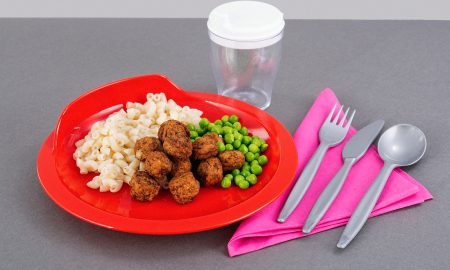 Dinner Served on Red Assisted Living Plate