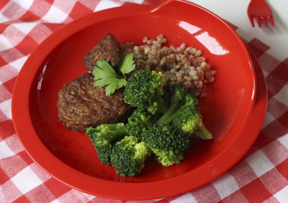 Dinner Served on a Red Assisted Living Plate