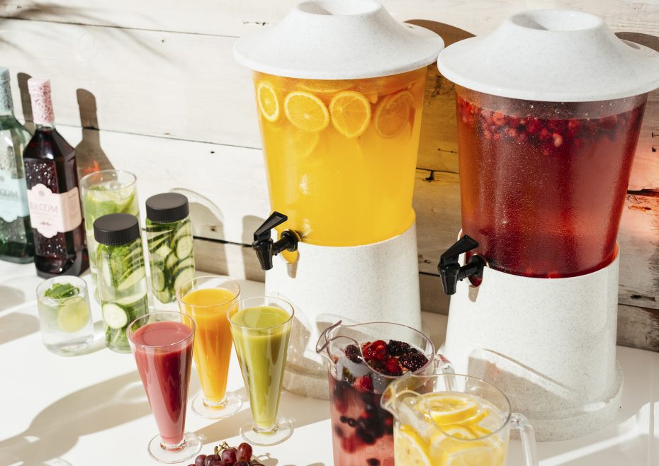 White Drink Dispensers with fresh fruit jucies