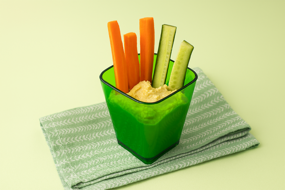 Hummus with Veggie Sticks in Small Translucent Green Dessert Pot