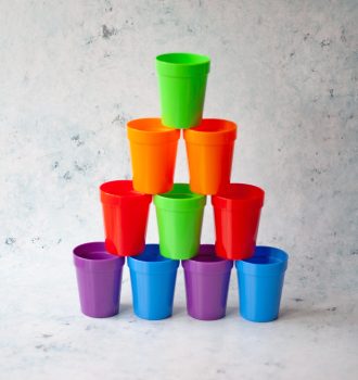Rainbow Tumblers Stacked in a Pyramid