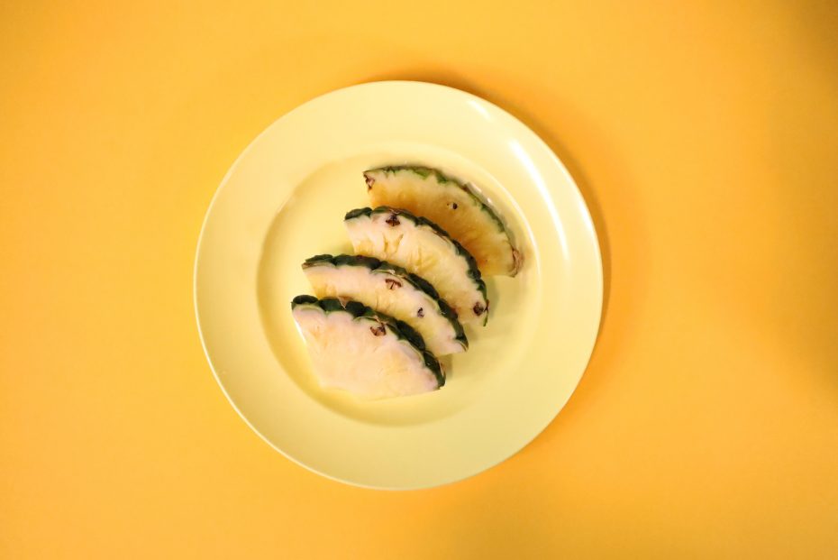 Pineapple Slices on Yellow Pastel Plate