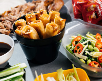 Black MultiPot with spring rolls