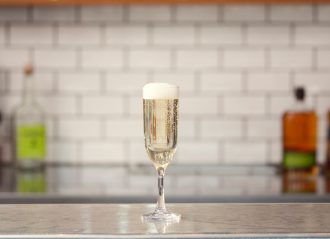 Aura Champagne Glass in Use