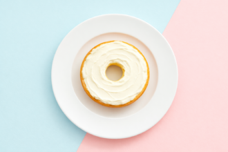 Cream Cheese Bagel on White Dessert Plate